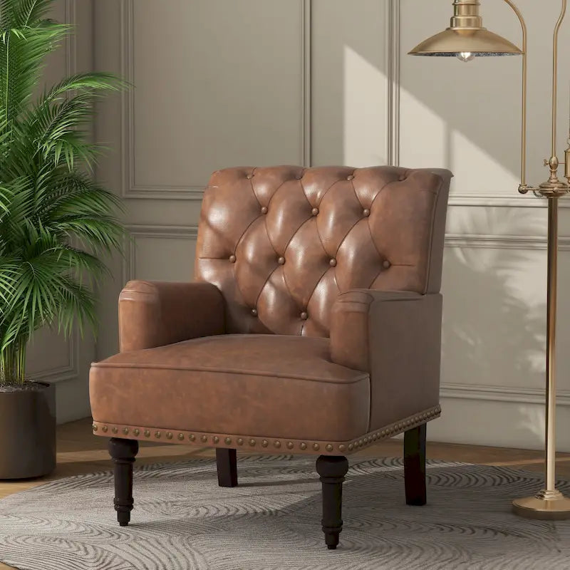 Poltroncina d'appoggio trapuntata in pelle sintetica beige/marrone/nera con dettagli borchiati e gambe intagliate, per 1 persona