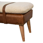 Panca rivestita in bouclé color rovere e pelle di bufalo, con gambe in legno massello, per 2 persone